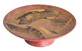 A large Japanese Negoro lacquer Koban [raised tray] lacquered in black and gold with overlapping