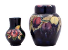 A Moorcroft jar and cover and a vase,