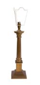 A gilt brass columnar table lamp by Laura Ashley Home, modern,