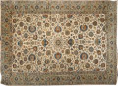 A Nain Carpet, the ivory field with a small central medallion and all over Shah Abbas designs,