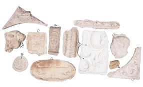 A group of twelve plaster casts of Neoclassical reliefs and architectural ornament,