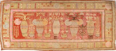 A rare and unusual Turkestan Khotan pictorial rug,