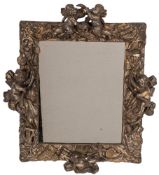 A Charles II carved and silvered wood wall mirror,