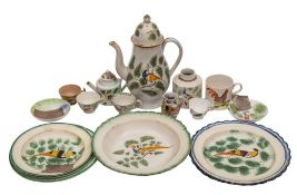 A group of English 'peafowl pattern pearlware included six plates and a coffee pot and cover,