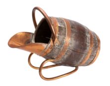 A Victorian oak and copper bound coal scuttle in the form of a barrel, late 19th century,