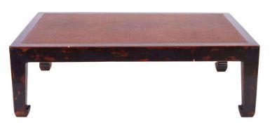 A Chinese stained hardwood and rattan low table,