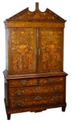 A fine Dutch walnut and marquetry cabinet on chest,