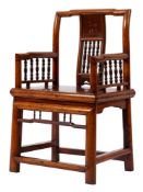 A Chinese stained hardwood elbow chair, early 20th century,