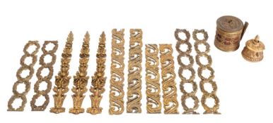 A quantity of 19th century ormolu and bronze mounts includes floral swags,