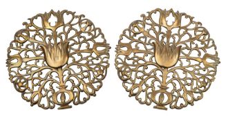 A pair of Arts and Crafts brass roundels in the manner of Ernest Gimson, last quarter 19th century,