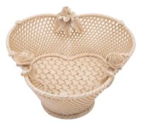 A small Belleek trefoil basket with three-strand basket work, the rim applied with flower sprays,
