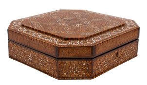 A Syrian parquetry octagonal hinged casket inlaid overall with complex geometric mosaic designs,