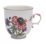 A large Meissen botanical cup the scroll handle with shell thumb piece,