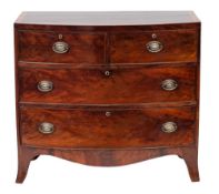 A late George III mahogany and crossbanded bowfront chest of drawers,