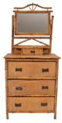 An Edwardian bamboo and rattan dressing chest,