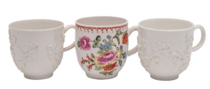 A group of three Bow coffee cups two in the white, one polychrome,