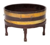 A George III mahogany and brass banded wine cooler,
