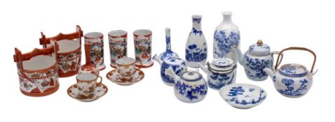 A group of Japanese porcelain, primarily blue and white, but including some late Kutani wares.