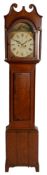 An oak and mahogany crossbanded longcase clock having an eight-day duration movement striking the
