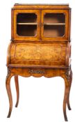 A walnut and crossbanded bureau de dame in Louis XV style,