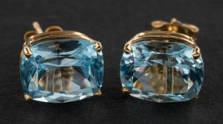 A pair of cushion-shaped, aquamarine ear studs, total estimated aquamarine weight ca. 6.