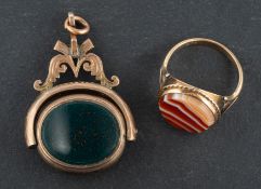 A banded agate ring and a carnelian and bloodstone swivel fob, the ring stamped '9CT',