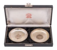 A pair of Indian silver circular pin dishes,