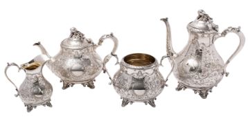 A Victorian silver plated four-piece tea and coffee service of squat circular form with engraved