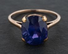 A cushion-cut, colour-change, blue-purple sapphire ring, estimated sapphire weight ca. 9.