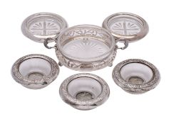 A pair of sterling silver mounted glass circular butter dishes, makers F.B.