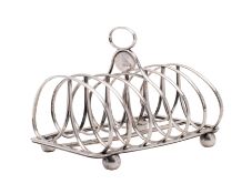 A William IV silver seven bar toast rack, maker possibly William Eaton,