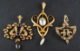 Three openwork pendants,