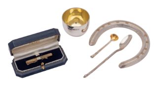 A quantity of bespoke London Silver: A long handled spoon and a shell bowl salt spoon,