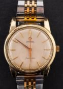 Omega Seamaster, a gentleman's gold-plated wristwatch the cream dial with raised baton numerals,