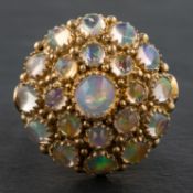 A round, cabochon-cut opal cluster cocktail ring, stamped '14K', length of ring head ca.