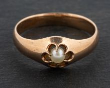 A cultured pearl ring, the cultured pearl is of light yellow hue with pinkish overtones,