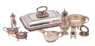 An assortment of silver plated items, comprising: a four-piece cruet set,