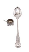 A Victorian silver circular salt, London 1883 and a spoon,