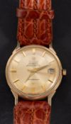 Omega Constellation, a gentleman's gold wristwatch the pie-dial with raised baton numerals,