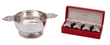 A set of four Cartier sterling silver pepperettes of polygonal shape, two with gilt covers, 3.