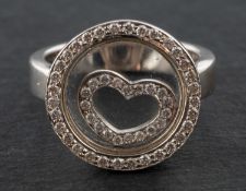 A single-cut diamond cluster ring,