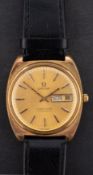 Omega Seamaster, a gentleman's gold-plated wristwatch the dial with raised baton numerals,