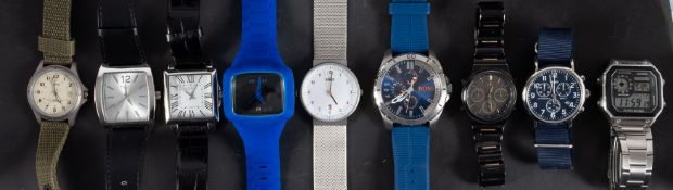 A group of nine fashion brand and other watches including Next, Hugo Boss, Braun, Nixon, Lorus,