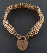 A gate-link bracelet with heart-shaped clasp, stamped '9CT', total length ca. 18cm, total weight ca.