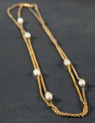 A ropetwist chain, with ovoid opal spacers, and a dog clip, the dog clip stamped '14',