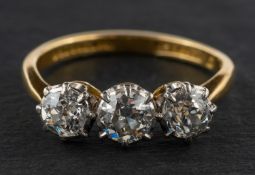 An old-cut diamond, three-stone ring, total estimated diamond weight ca. 1.