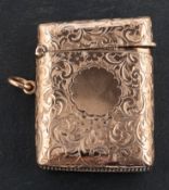An Edwardian, 9ct gold vesta case, with floral and foliate engraving and hallmarks for Birmingham,