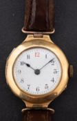 A 18ct gold ladies wristwatch the white enamel dial with Arabic numerals and blued steel spade