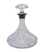 A silver mounted cut glass ships decanter and mushroom stopper of traditional shape.