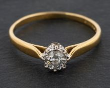 An 18ct gold, round, brilliant-cut diamond single-stone ring, estimated diamond weight ca. 0.